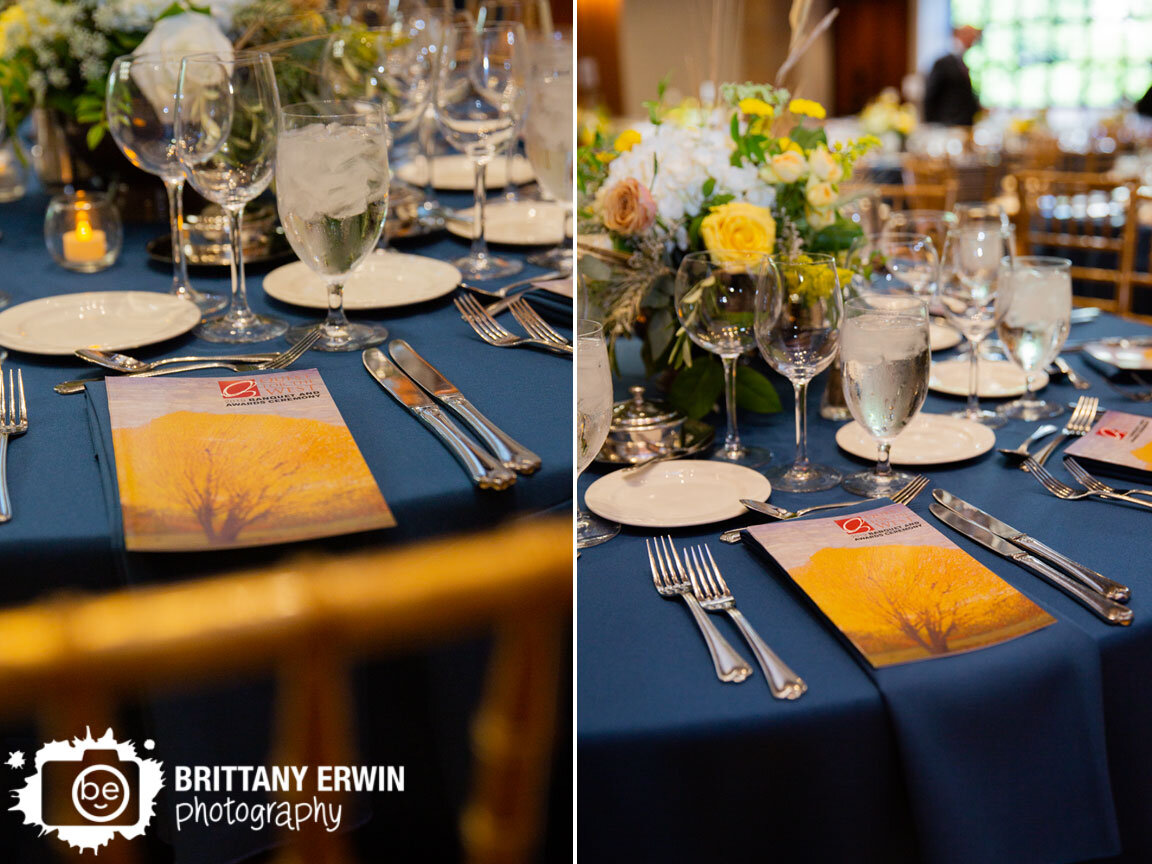 quest-for-the-west-banquet-ad-awards-ceremony-table-setting-candles-glasses-flower-centerpiece.jpg