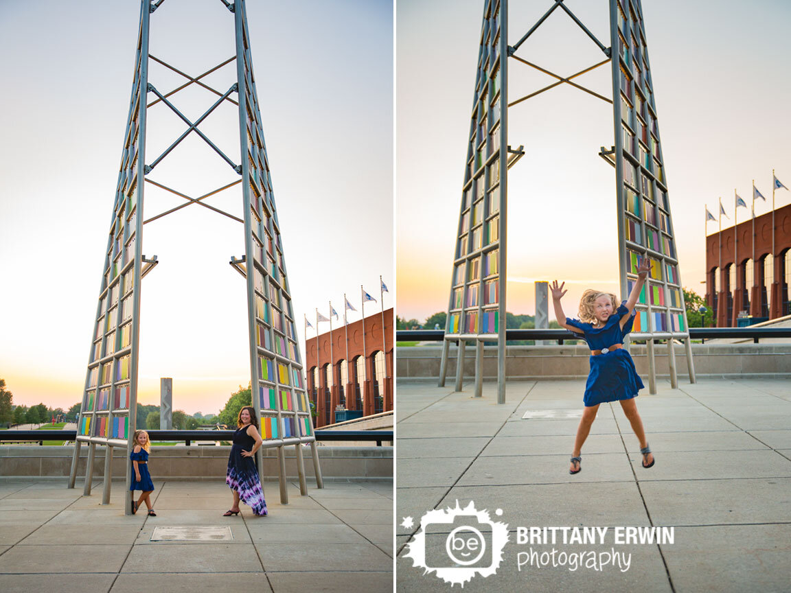Downtown-Indianapolis-mother-daughter-portrait-silly-jumping-sculpture.jpg