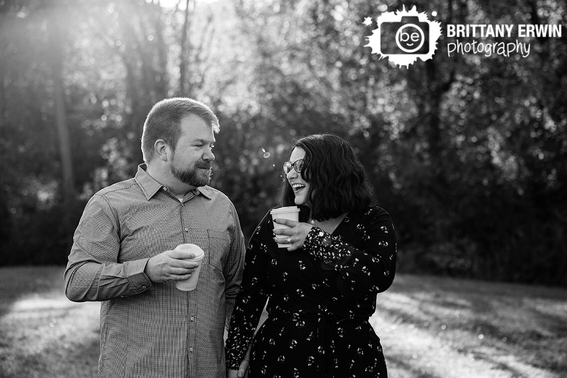 Camby-Indiana-engagement-portrait-photographer-couple-coffee-cups-walking.jpg