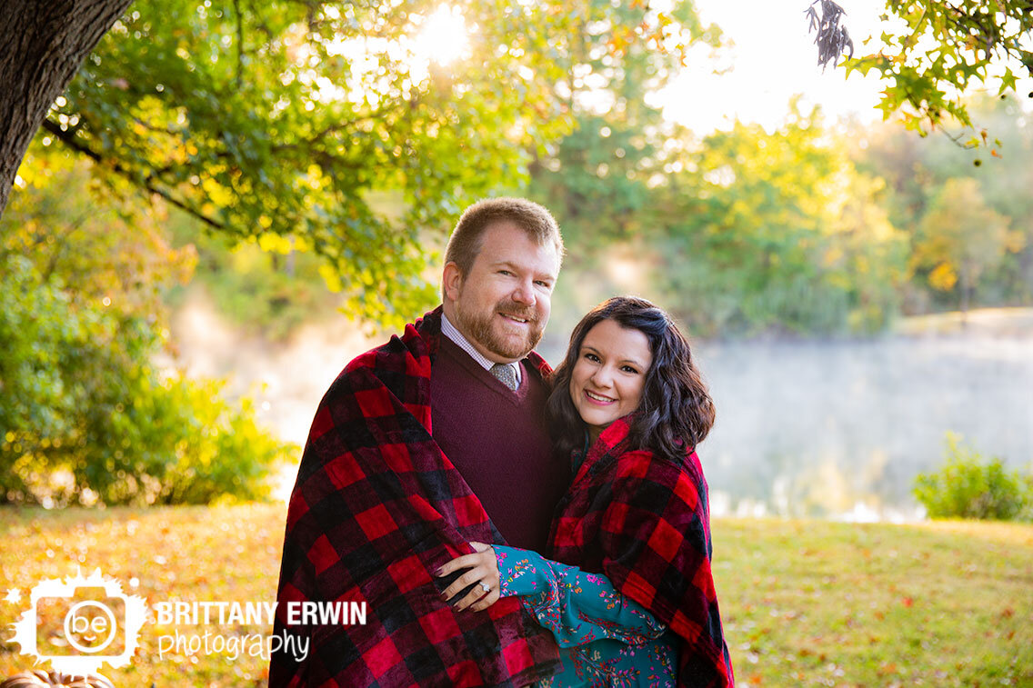 Indianapolis-engagement-portrait-photographer-sunrise-steam-on-pond-water-couple-snuggle-with-blanket.jpg