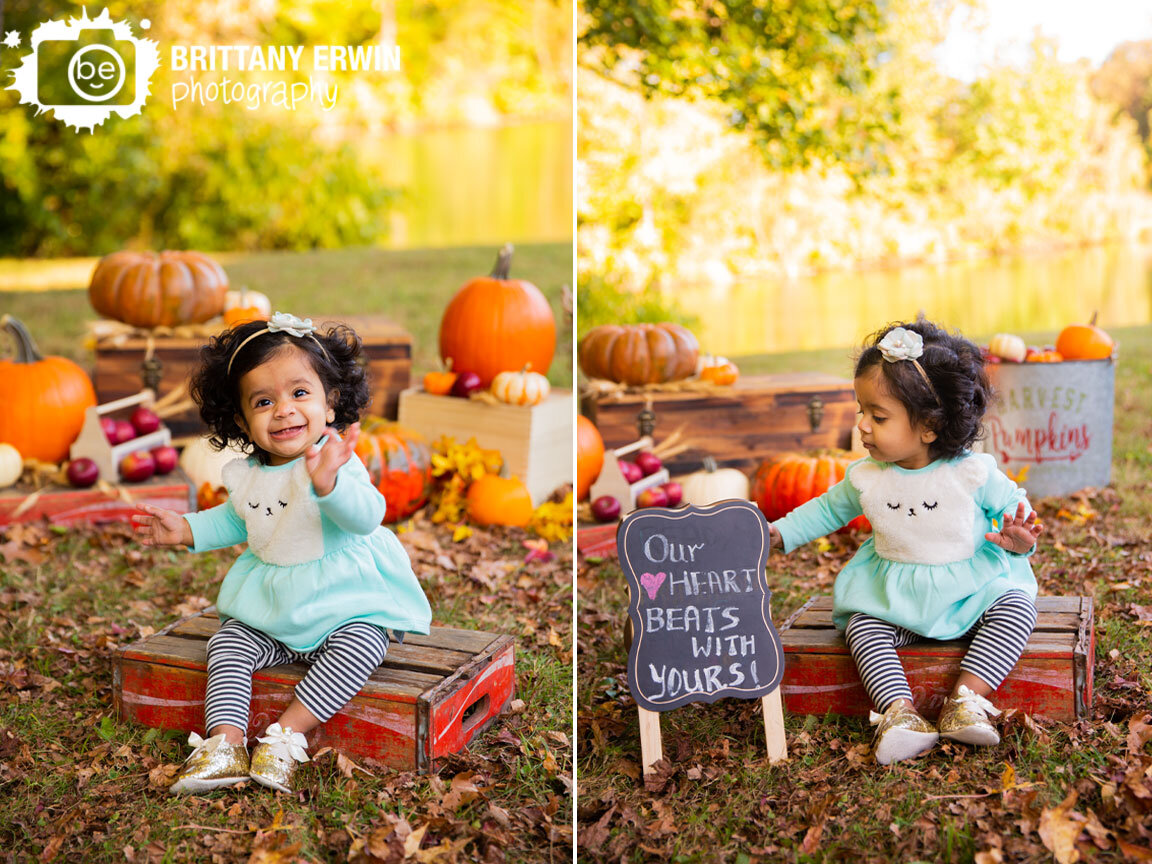 fall-pumpkins-milestone-session-girl-sitting-on-vintage-soda-box.jpg