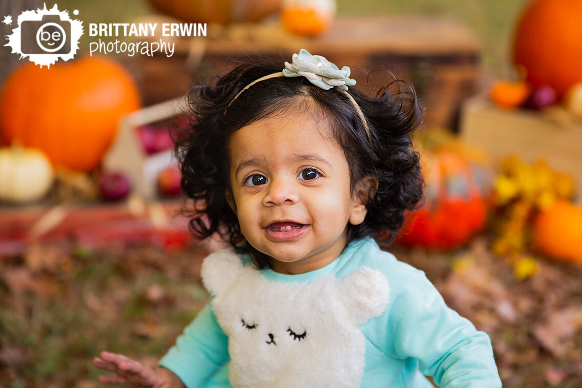 Indianapolis-fall-mini-session-milestone-9-month-baby-girl-pumpkins.jpg