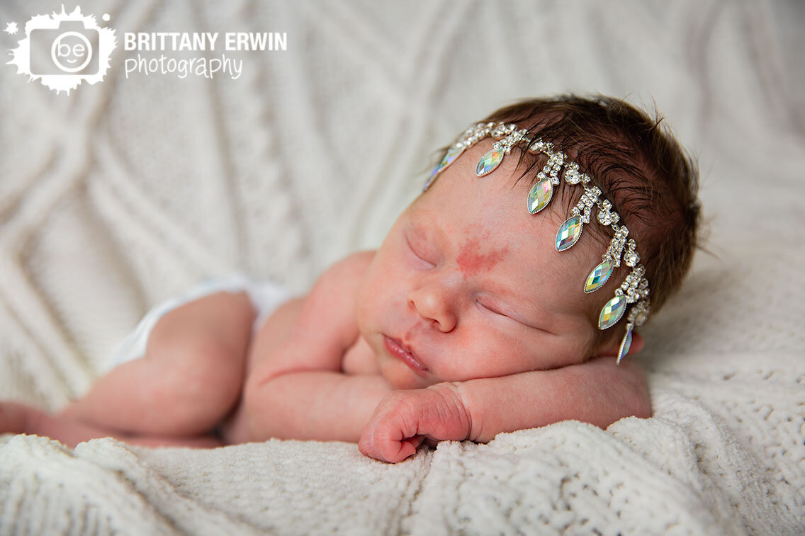 Sleeping-baby-girl-newborn-portrait-cable-knit-blanket-queen-tiara-headband.jpg