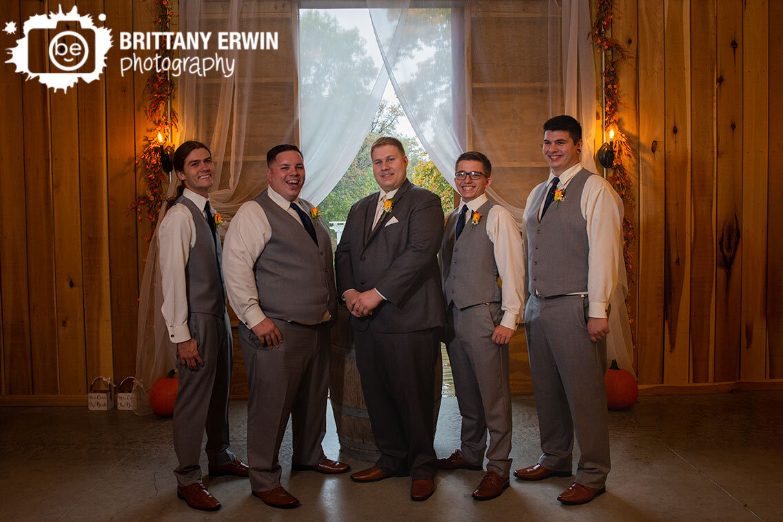 barn-wedding-photography-group-portrait-groom-groomsmen-open-doors.jpg