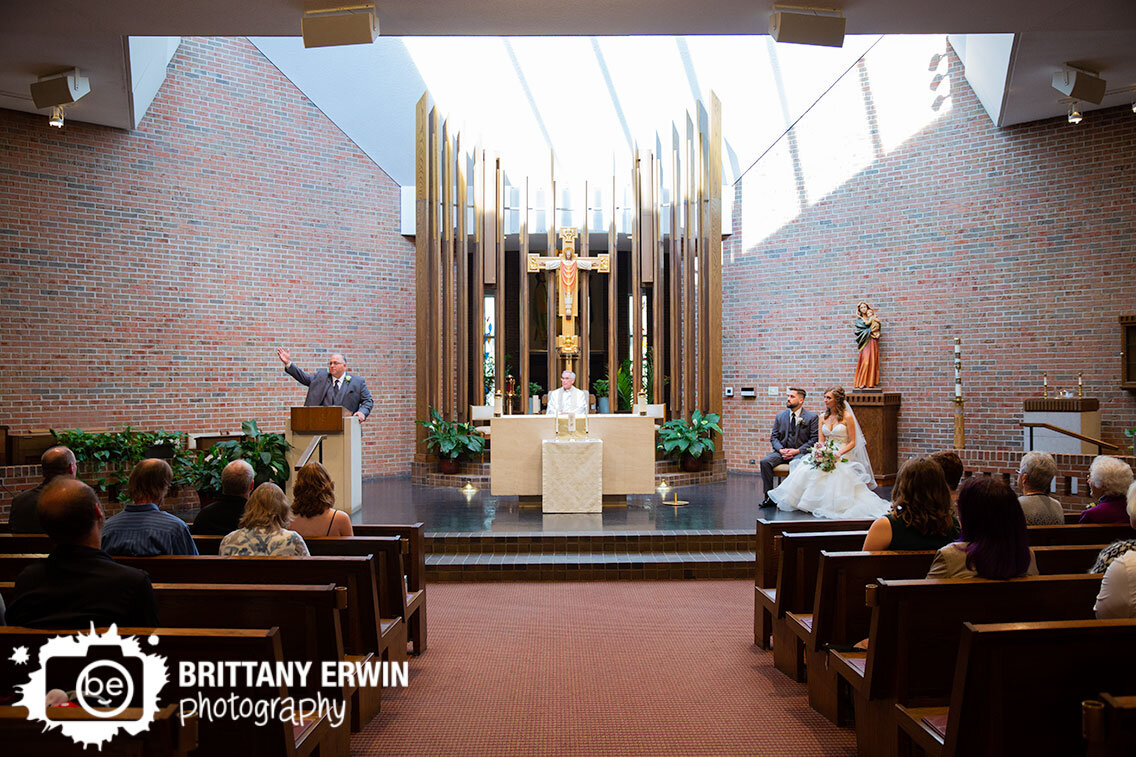 father-of-groom-singing-at-ceremony-catholic-church-wedding.jpg
