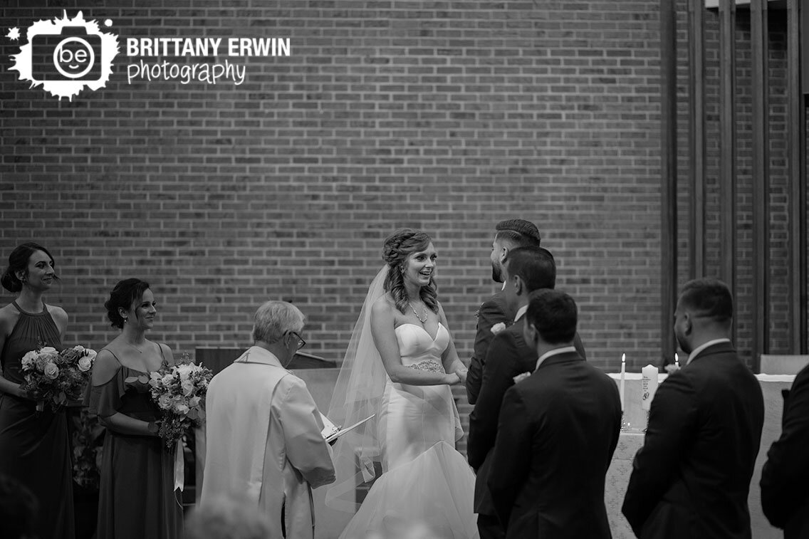 Bride-reaction-at-altar-couple-ceremony-catholic-church.jpg