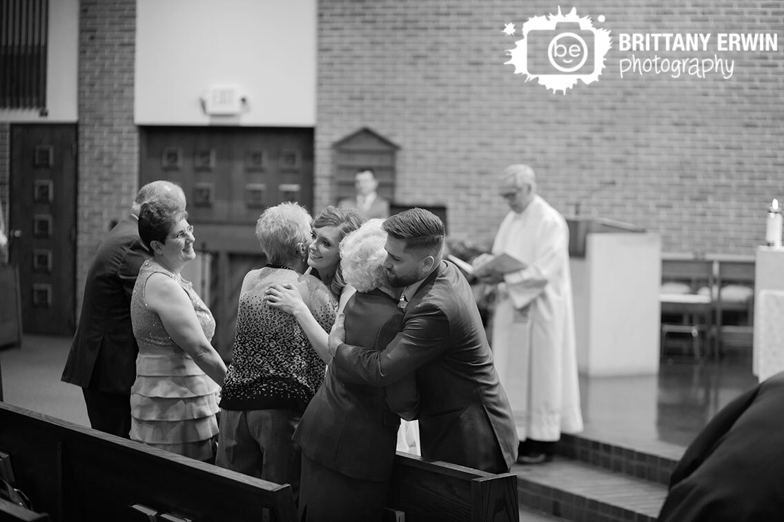 Indianapolis-wedding-photographer-bride-and-groom-greet-grandparents-sign-of-peace.jpg