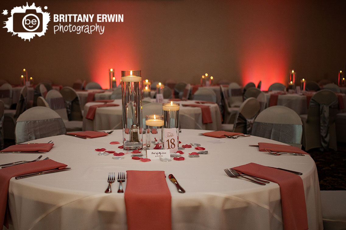 Indianapolis-wedding-photographer-reception-venue-white-tablecloth-pink-napkin-candle-centerpiece.jpg