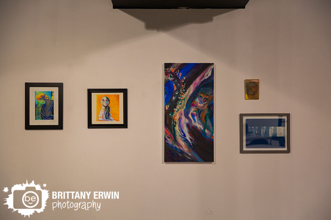 group-show-gallery-opening-paintings-framed-work.jpg