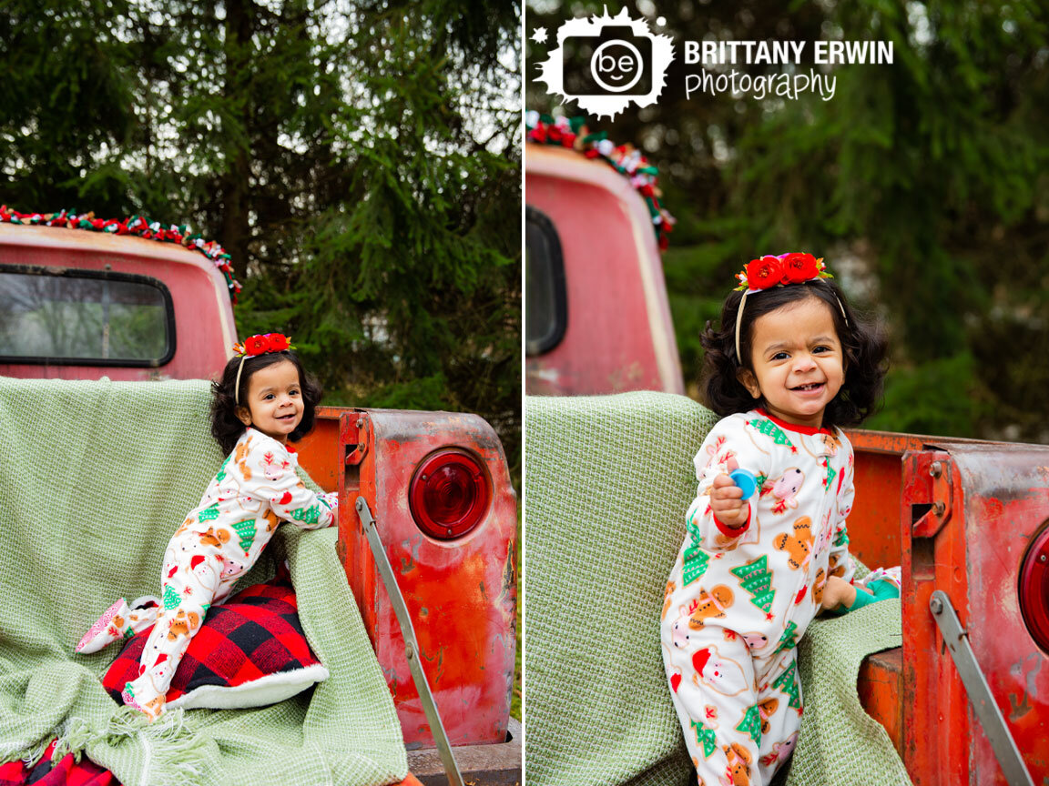 First-birthday-christmas-pajamas-playing-in-red-classic-truck-buffalo-plaid-pillow.jpg