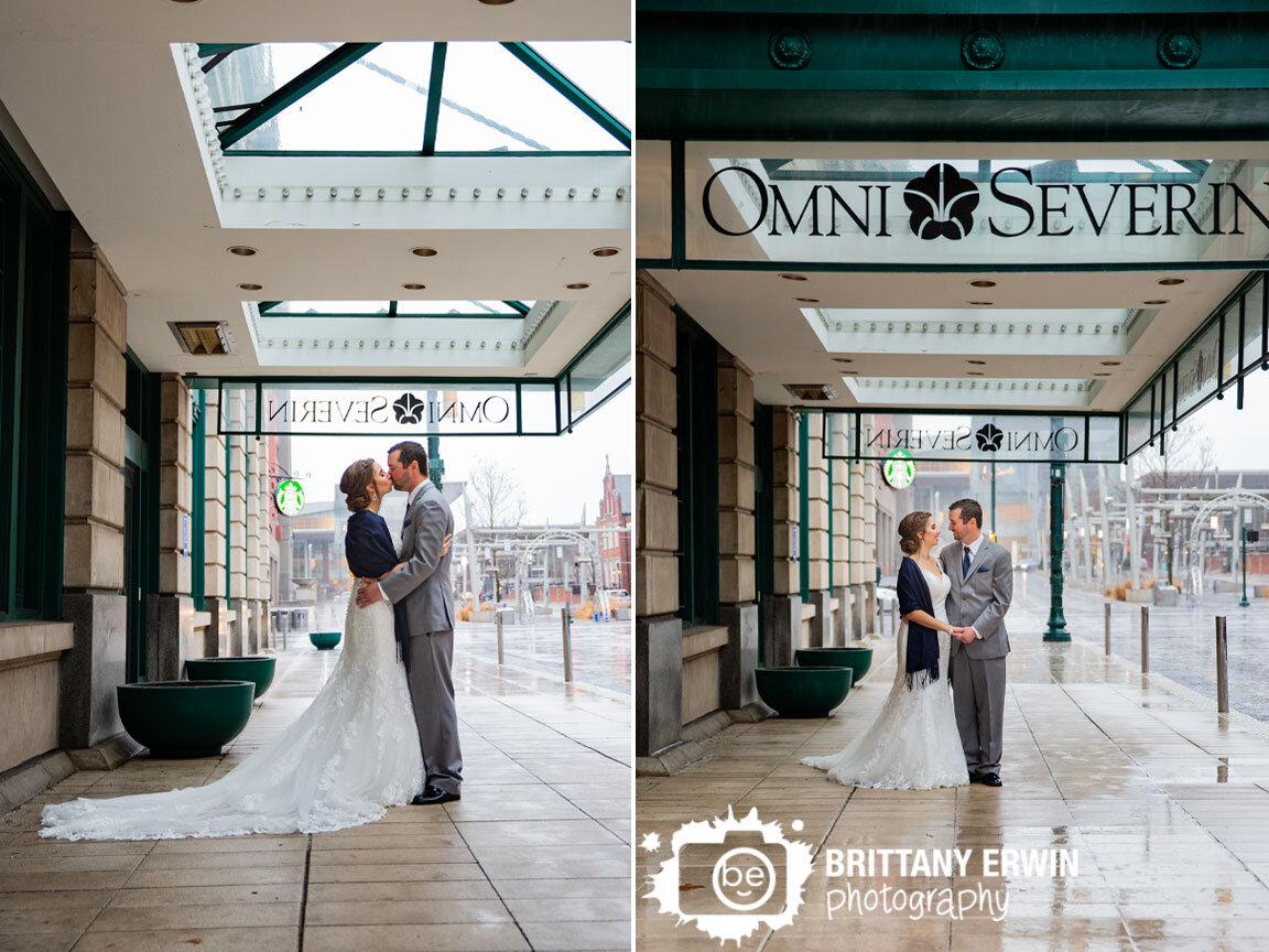 Omni-Severin-wedding-photographer-bridal-portrait-bride-groom-under-awning-rainy-day-downtown-Indianapolis.jpg