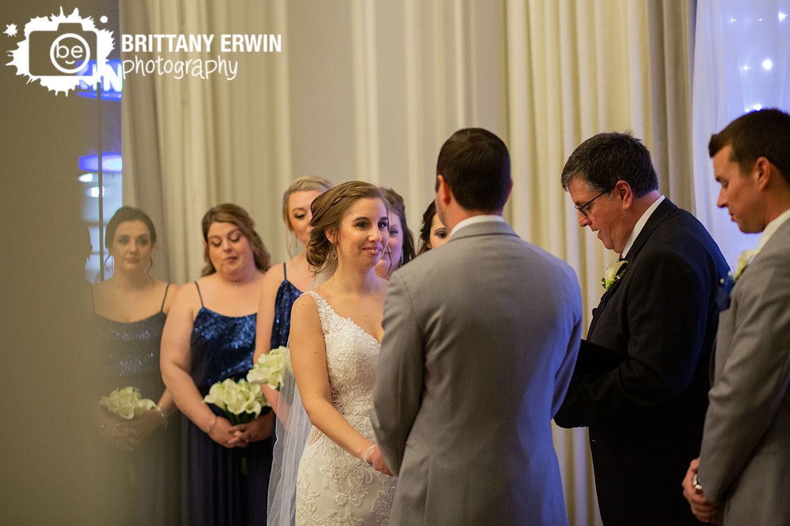 bride-reaction-groom-vows-at-altar-Omni-Severin-Indianapolis-hotel-venue.jpg