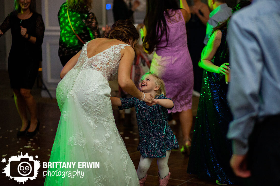 bride-dancing-with-little-girl-at-wedding-reception.jpg