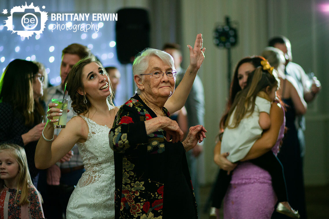 Indianapolis-Omni-Severin-hotel-wedding-reception-photographer-bride-dancing-with-grandmother.jpg