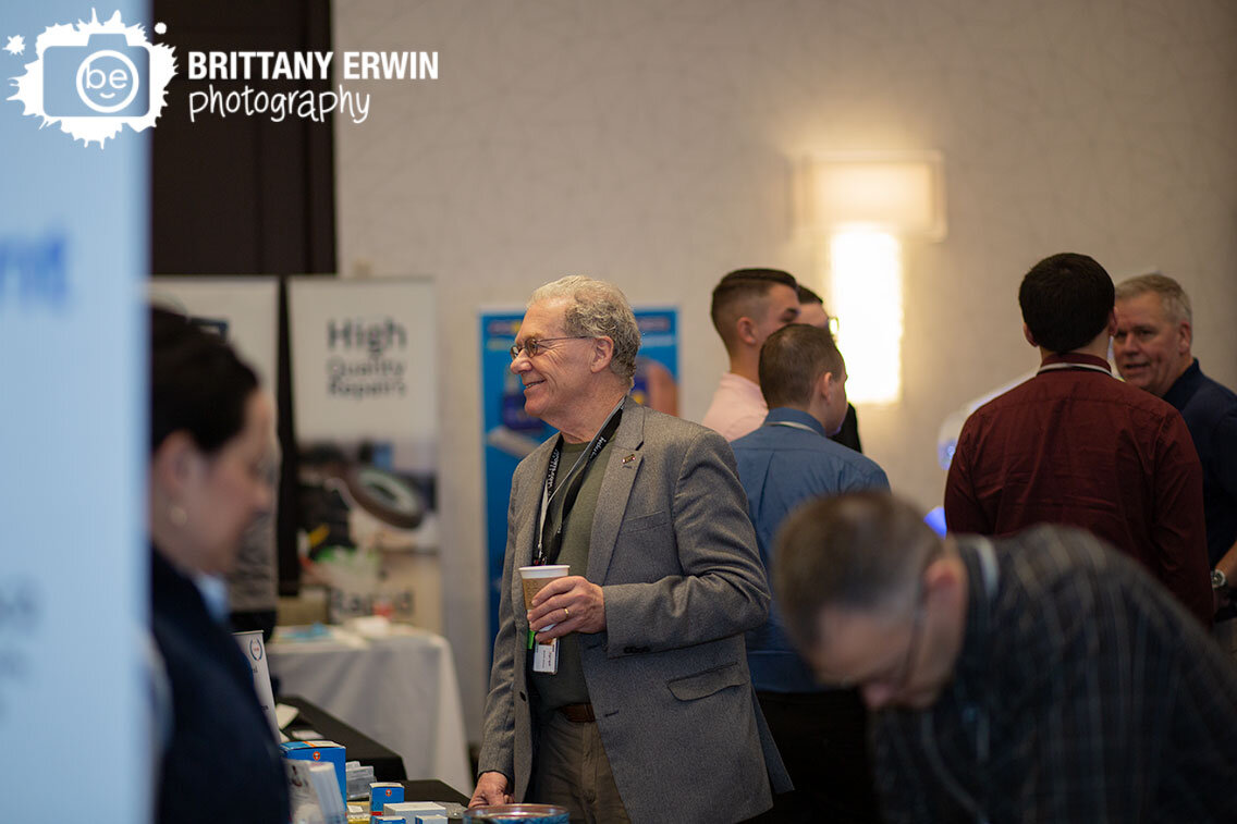 Indianapolis-event-photographer-guests-at-convention-talking-at-booths.jpg