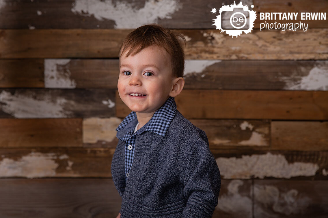 Indianapolis-barn-wood-wall-reclaimed-pallet-backdrop-toddler-birthday-boy.jpg