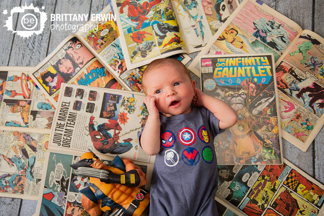 Indianapolis-nerdy-newborn-portrait-photographer-comic-books-xmen-wolverine-figure-open-comics.jpg