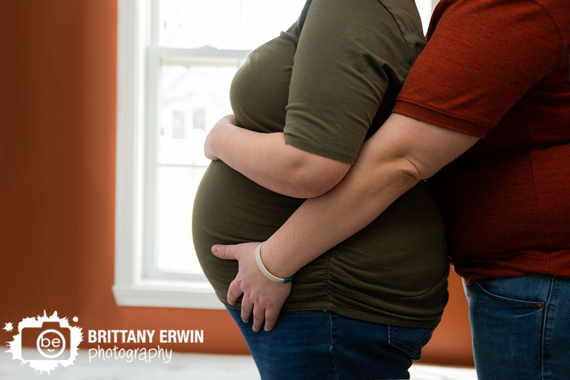 Indianapolis-in-home-maternity-portrait-photographer-couple-in-window.jpg