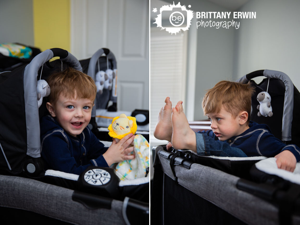 toddler-boy-playing-in-crib-nurdery-bassinet.jpg