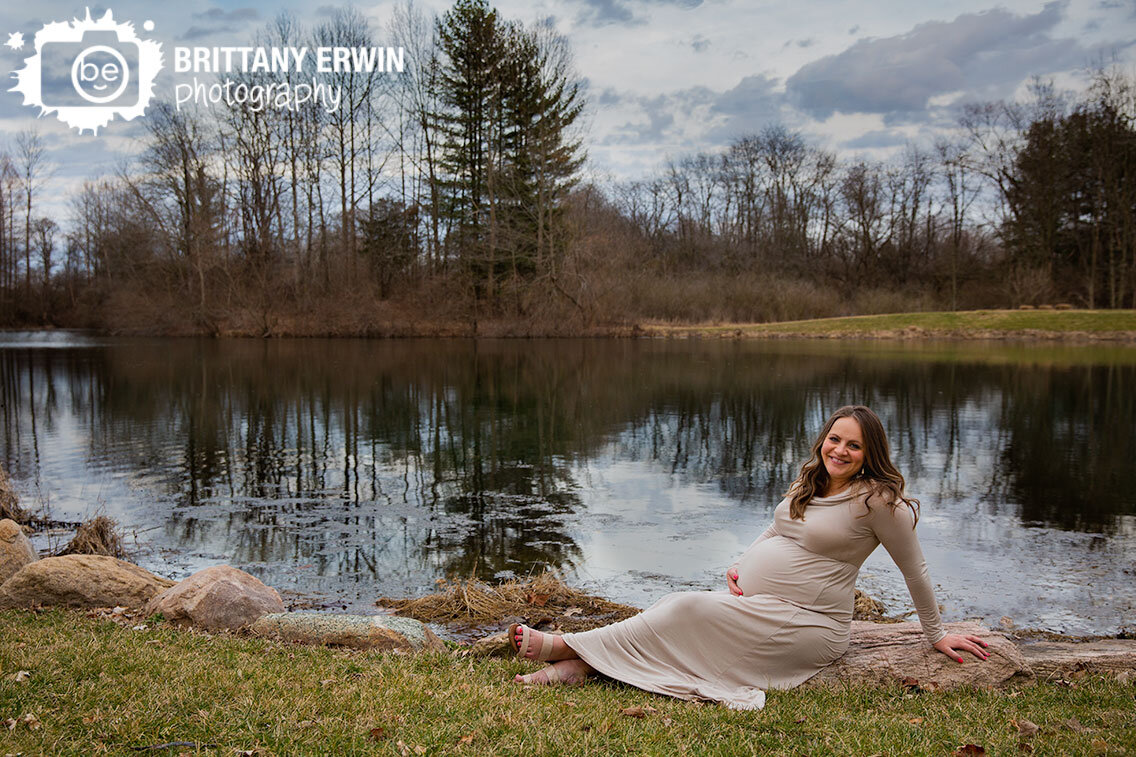 Indianapolis-maternity-portrait-photographer-mother-to-be-by-pond-cloudy-sky.jpg