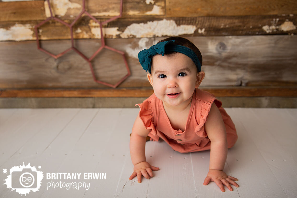 baby-girl-first-birthday-portrait-studio-photographer-rustic-wood.jpg