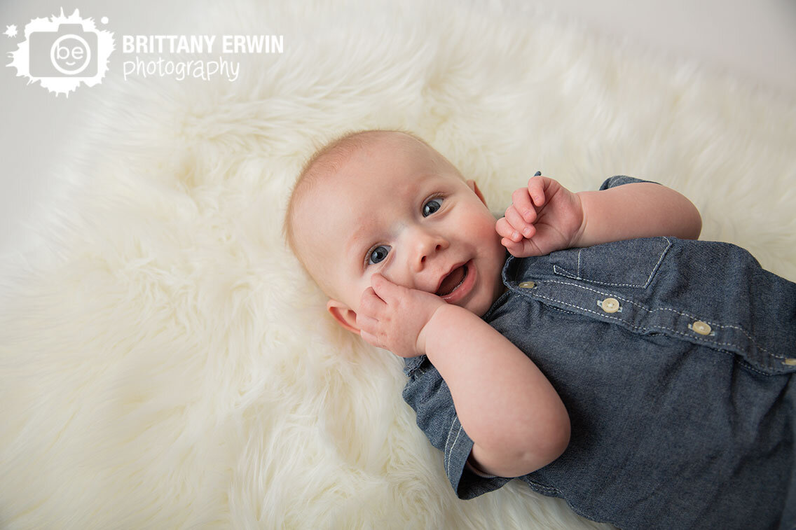 Indianapolis-portrait-studio-photographer-baby-boy-milestone-silly-sweet-face-fuzzy-rug.jpg