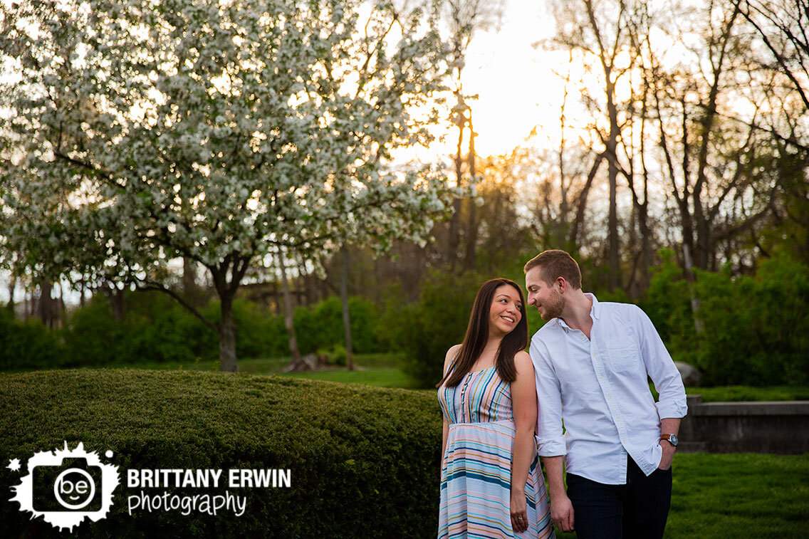 Indianapolis-portrait-photographer-engagement-couple-spring-sunset-by-flowering-tree.jpg