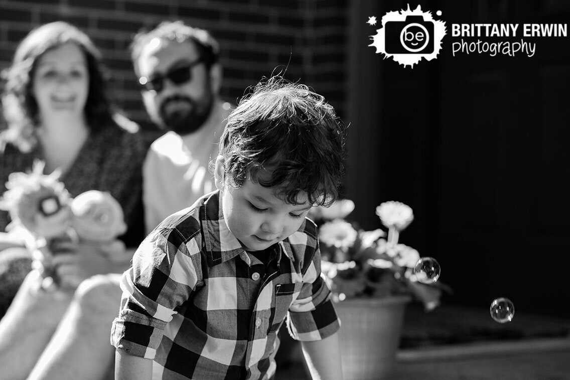 boy-playing-outside-with-bubble-machine-social-distance-no-contact-session.jpg