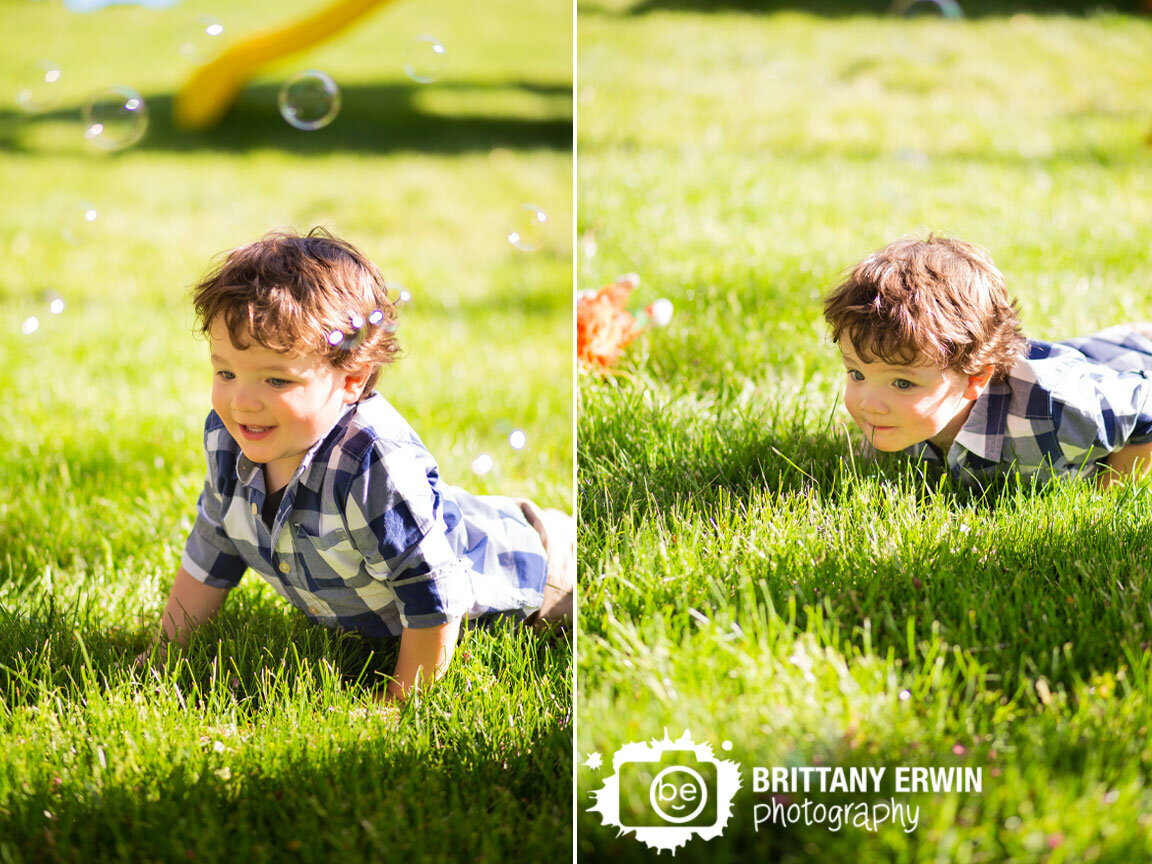 Indianapolis-portrait-photographer-toddler-playing-outside-in-grass.jpg