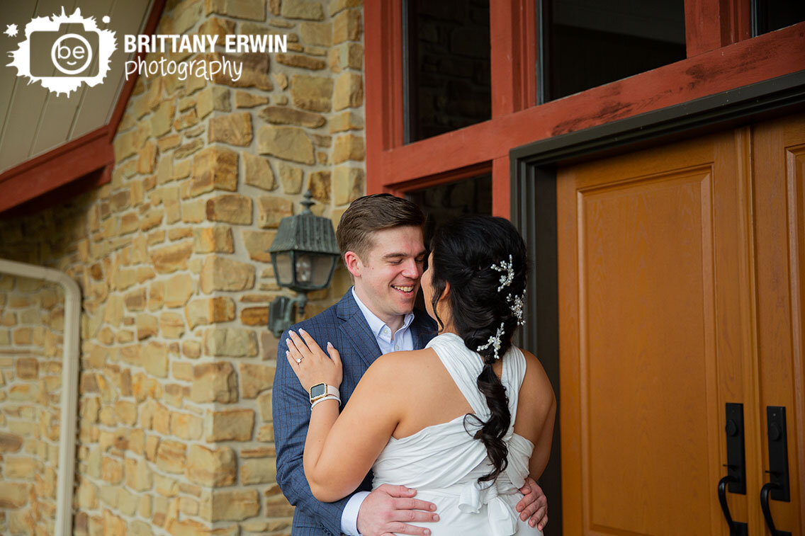 Shelbyville-wedding-photographer-first-look-outside-front-doors.jpg