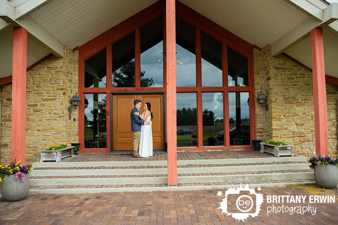 Shelbyville-Indiana-wedding-photographer-couple-first-look-on-front-porch-steps.jpg