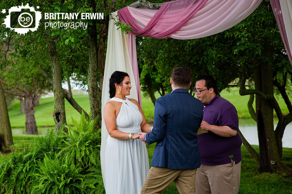 Shelbyville-Indiana-wedding-photographer-backyard-ceremony-couple-exchange-vows.jpg