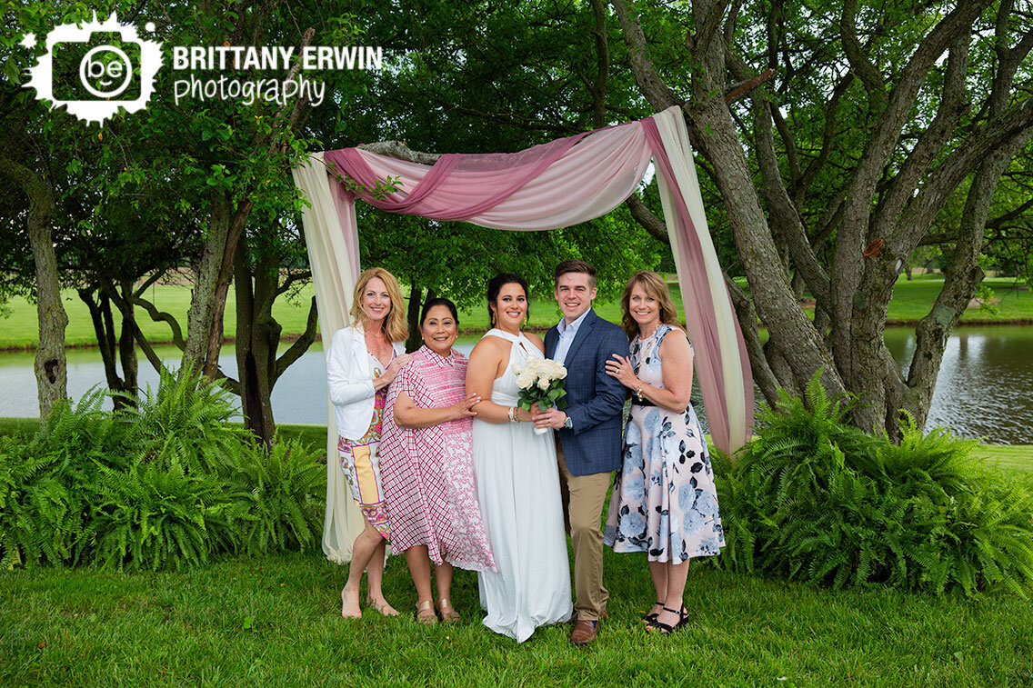 backyard-wedding-photographer-couple-with-mother-moms.jpg