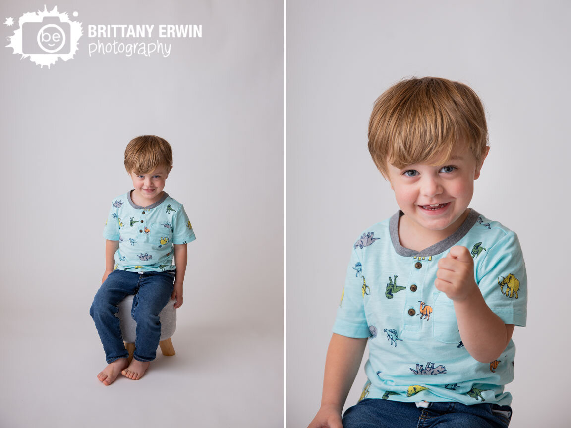 Indianapolis-portrait-studio-photographer-white-seamless-backdrop-boy-toddler-dinosaur-grey-stool.jpg