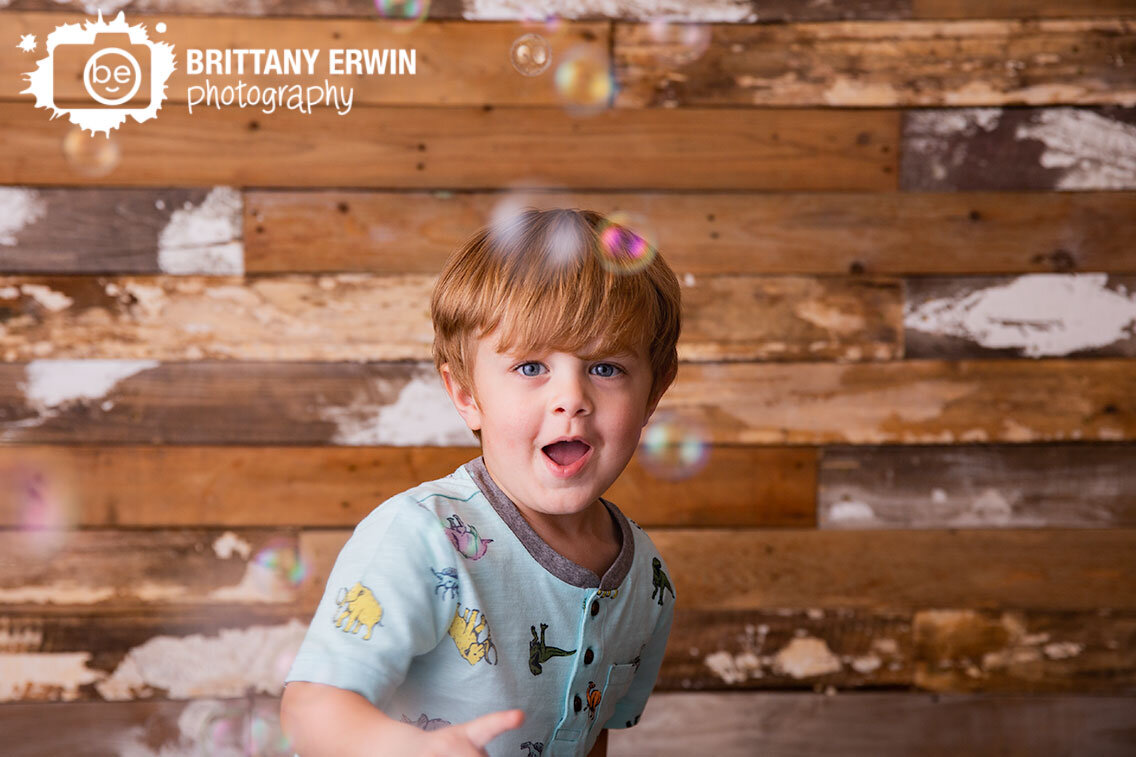 silly-boy-playing-with-bubbles-laughing-face-indiana-portrait-studio.jpg