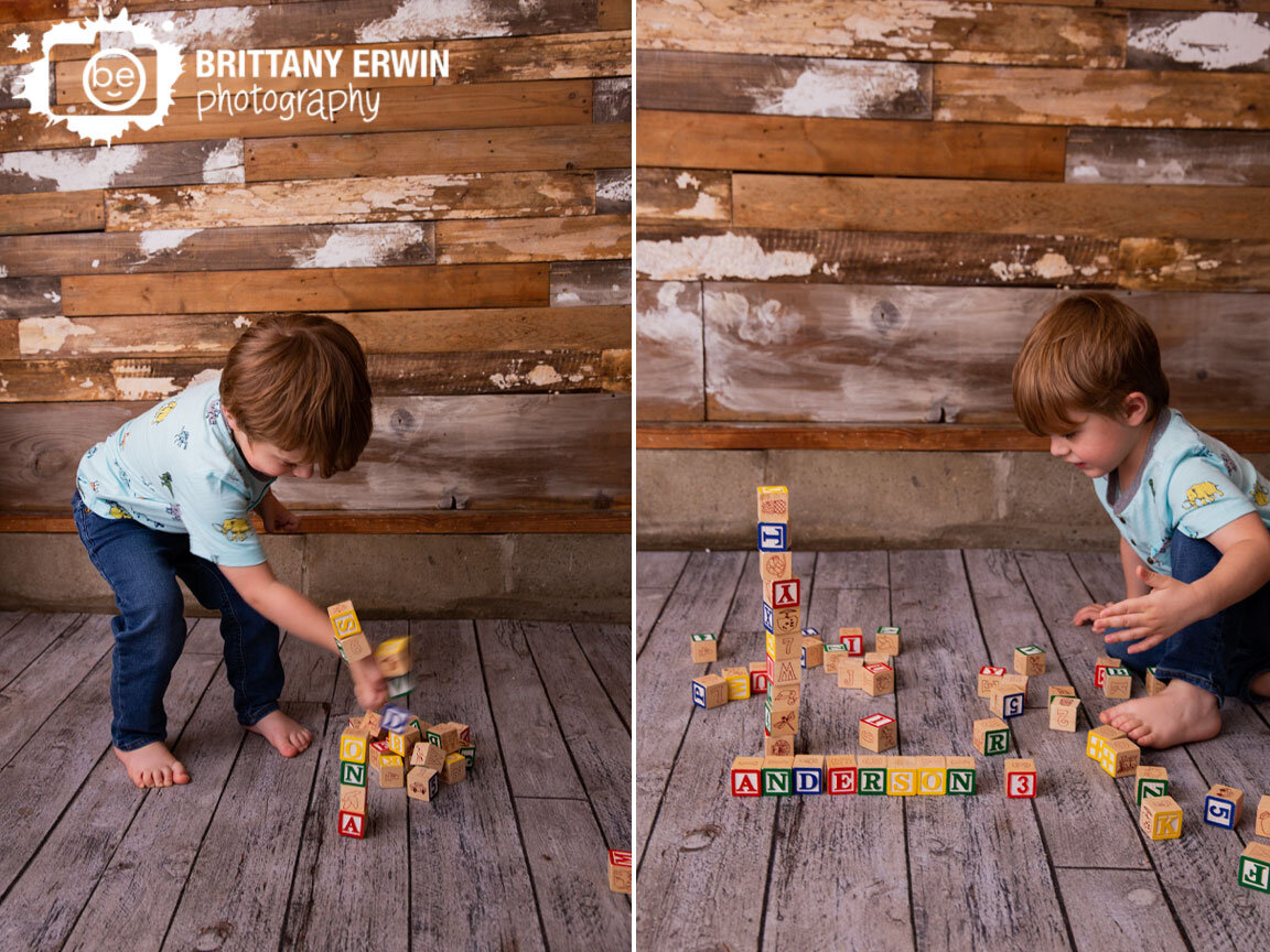 Indianapolis-portrait-studio-photographer-rustic-wood-playing-blocks-name-3-year-old.jpg