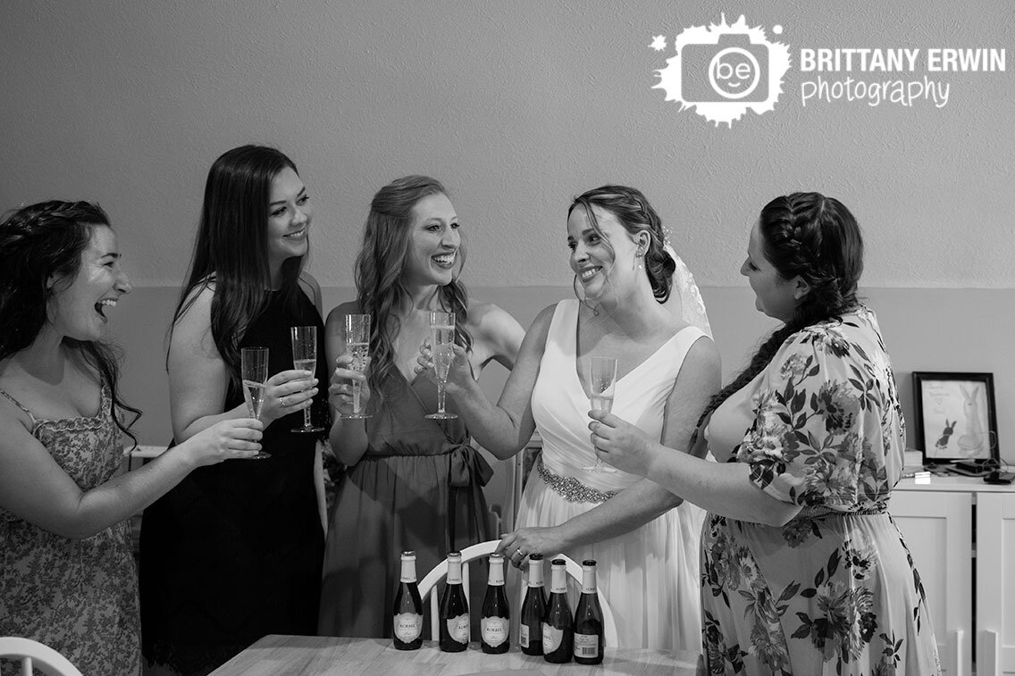 bride-bridesmaids-toast-champagne-wedding.jpg