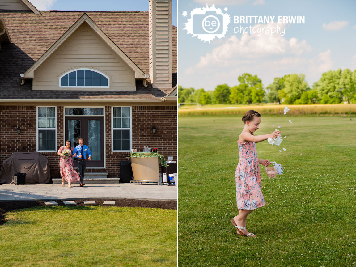 Indianapolis-wedding-photographer-flower-girl-throwing-flowers-up-in-the-air.jpg