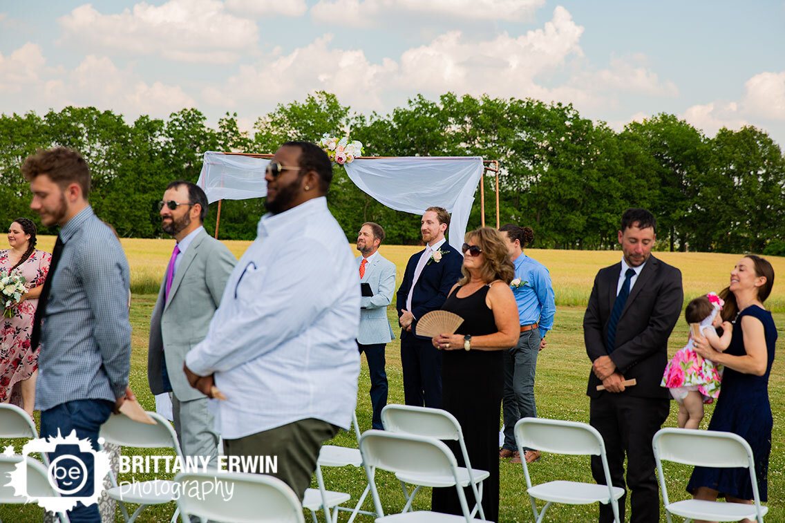 Indianapolis-wedding-photographer-groom-watching-bride-walk-down-aisle.jpg