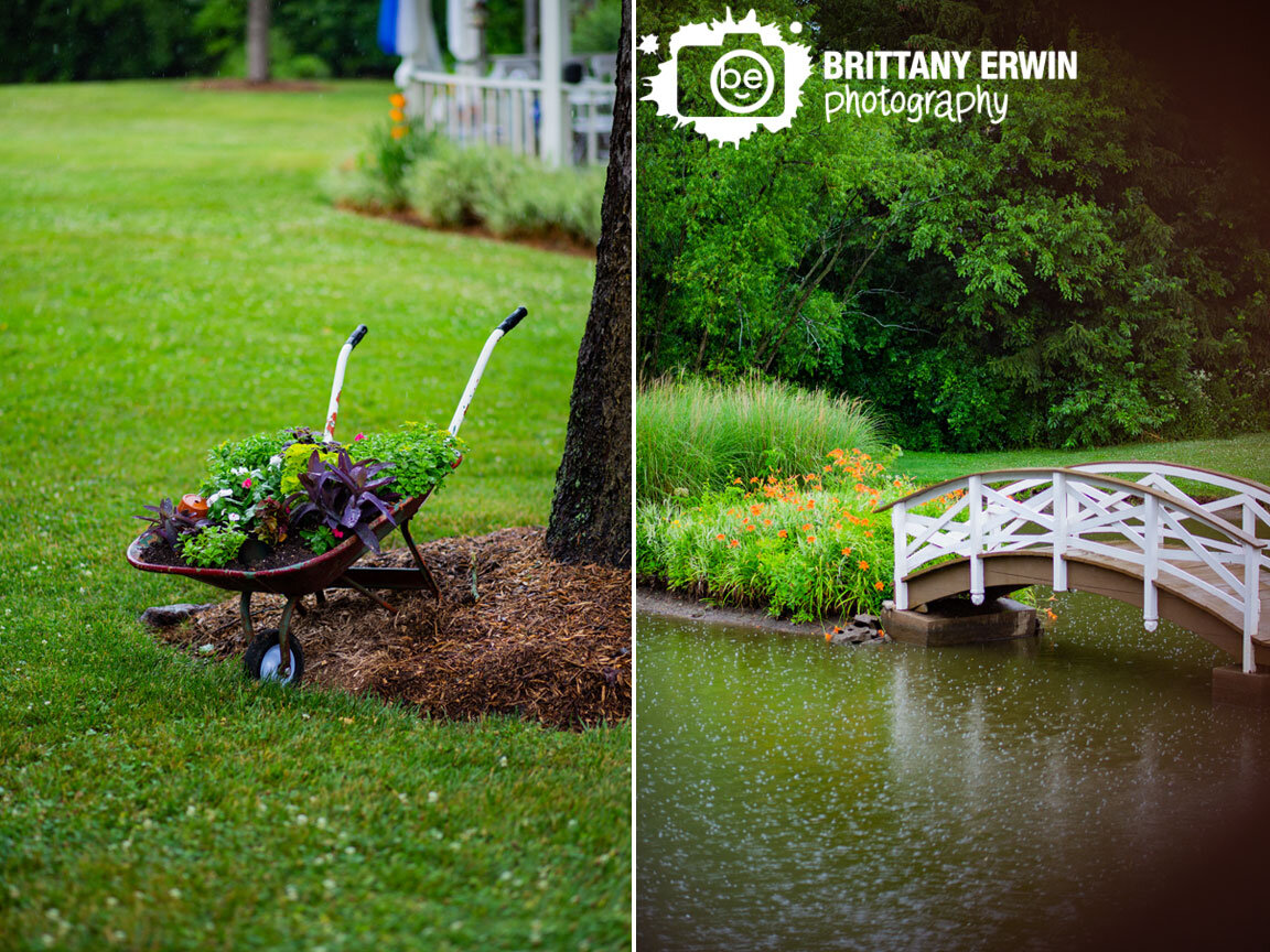 rainy-day-wedding-photographer-pond-with-bridge-flowers-on-island-in-wheelbarrow.jpg