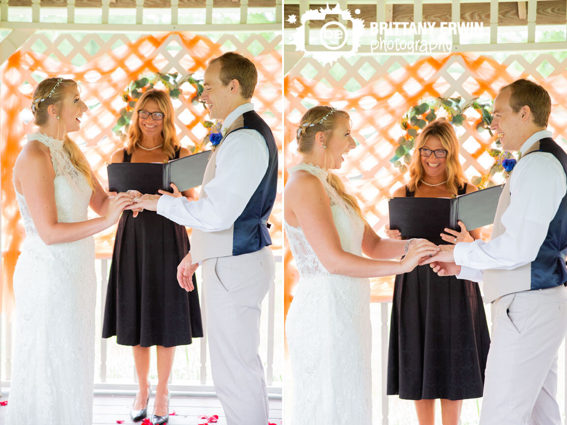 ring-exchange-indianapolis-wedding-ceremony-photographer-laughing-officiant-bride.jpg