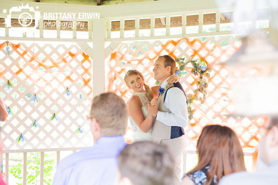 gazebo-first-dance-outdoor-wedding-photographer-bride-laughing.jpg
