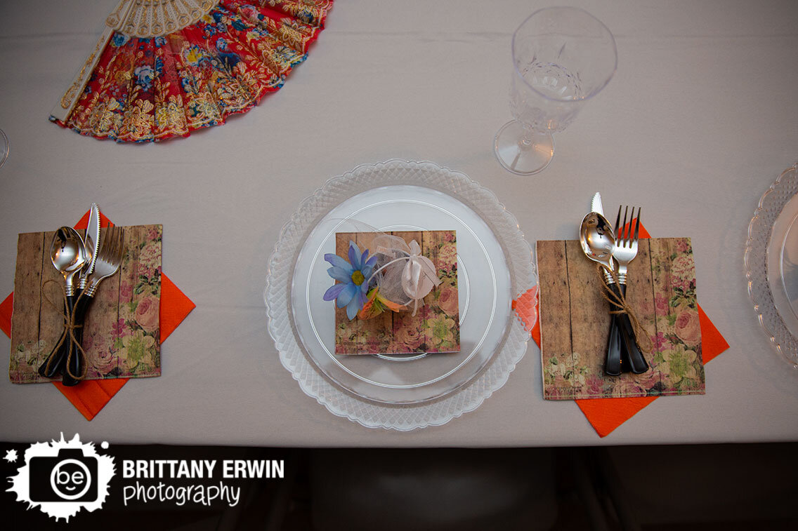 Indianapolis-wedding-reception-photographer-place-setting-twine-tied-silverware-clear-plates-with-napkins.jpg