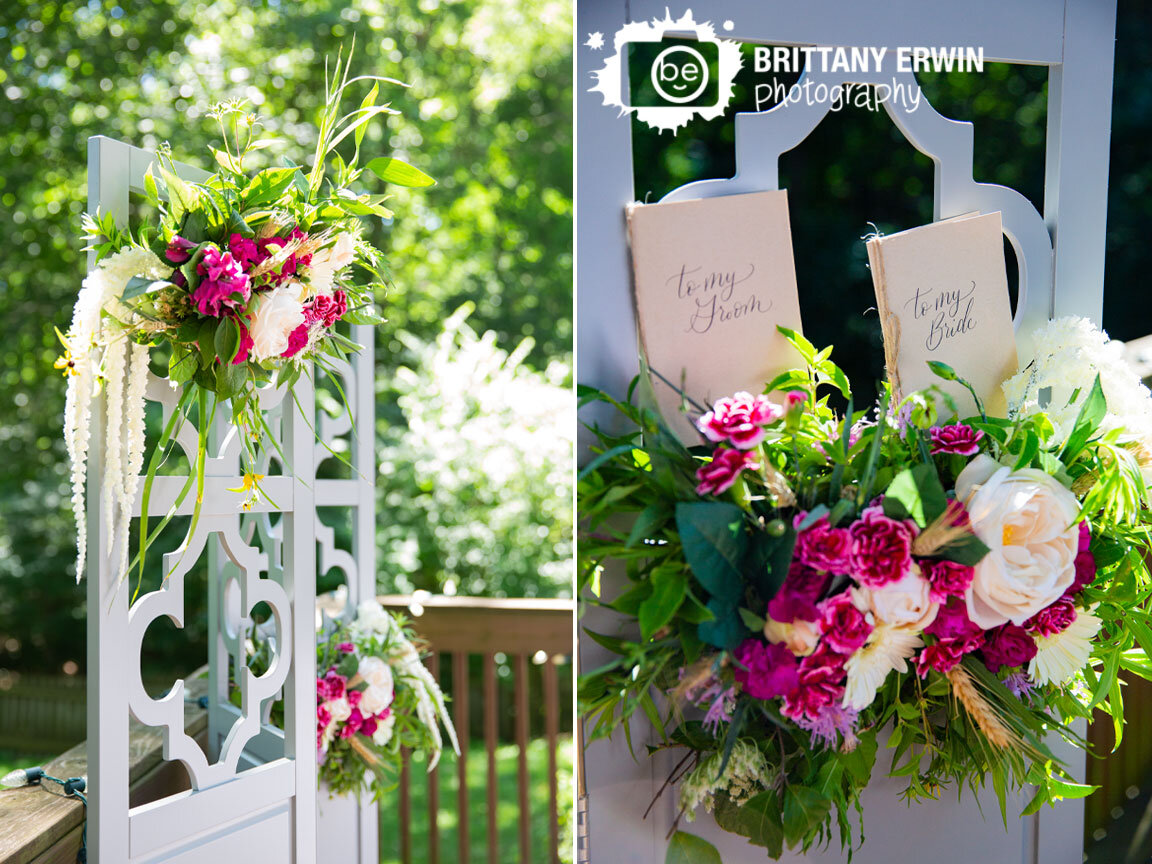 Outdoor-backyard-wedding-altar-setup-with-flowers-to-my-bride-groom-hand-written-vows-books.jpg