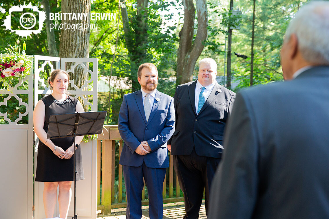 groom-reaction-bride-walking-down-aisle-outdoor-ceremony.jpg