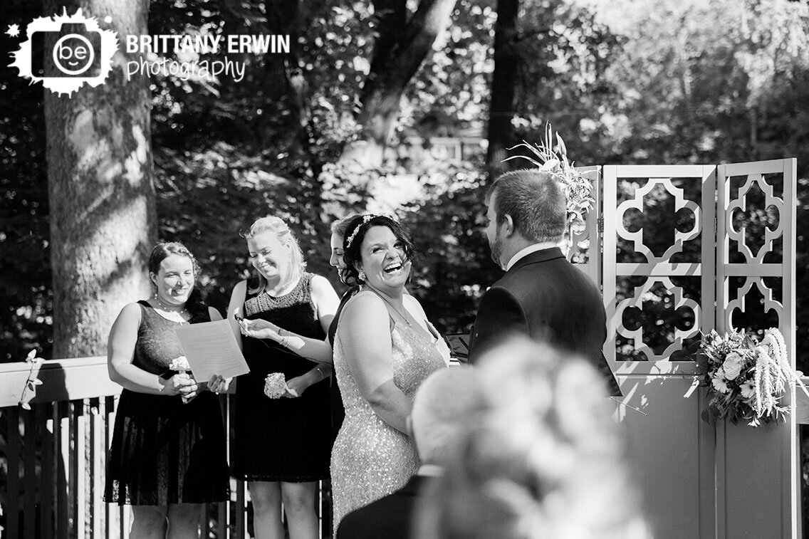 Indiana-wedding-photographer-lafayette-outdoor-ceremony-bridesmaids-reading.jpg