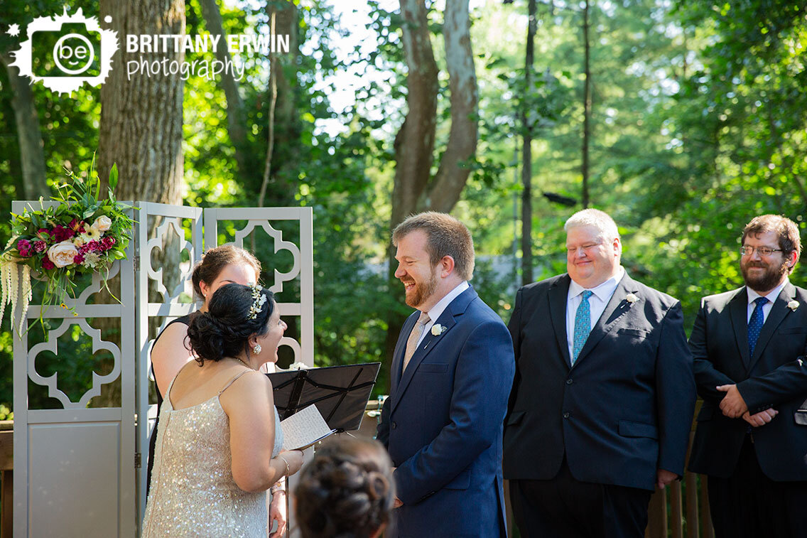 Indiana-wedding-ceremony-photographer-reading-vows-hand-written-reaction-laughing.jpg
