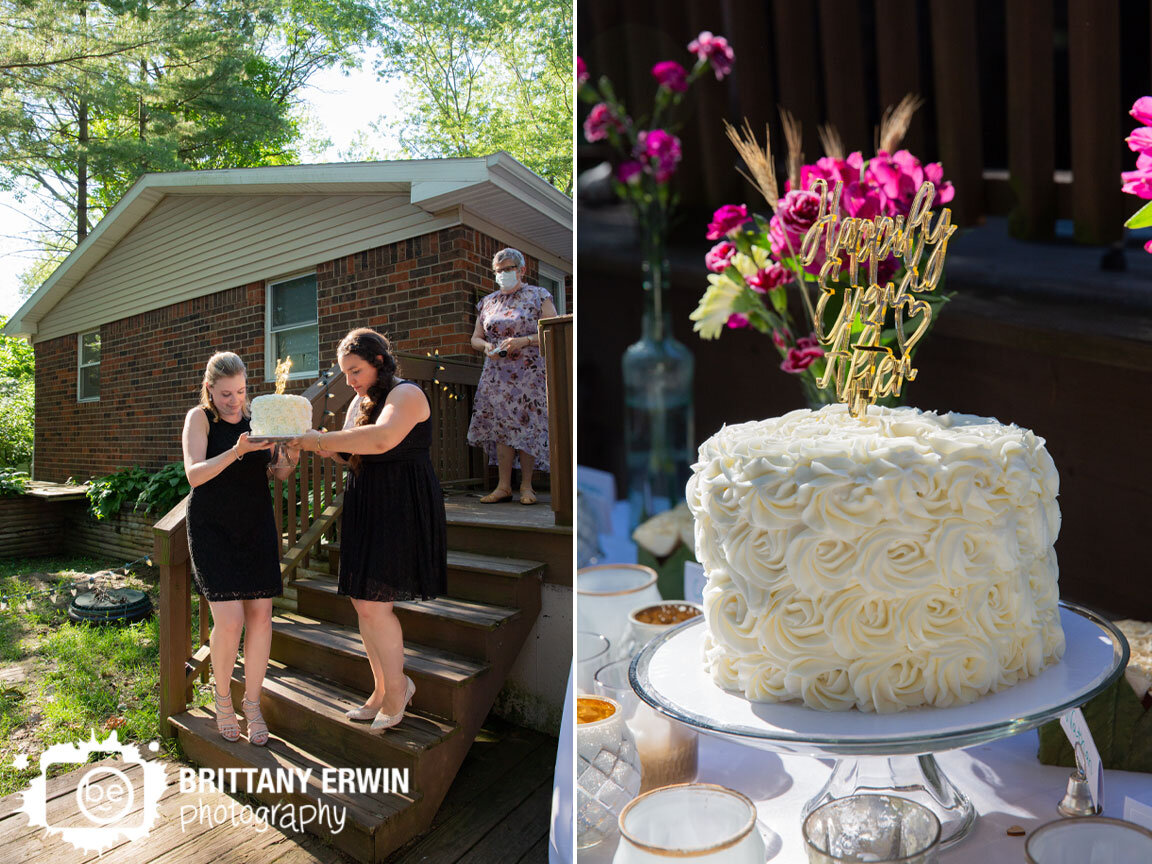Lafayette-Indiana-wedding-photographer-bridesmaids-carry-cake-outside-for-reception.jpg