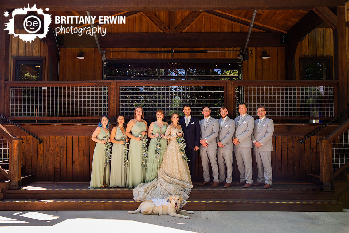 Greencastle-Indiana-wedding-photographer-3-fat-labs-venue-outside-with-pet-dog-bridal-party-on-stairs.jpg
