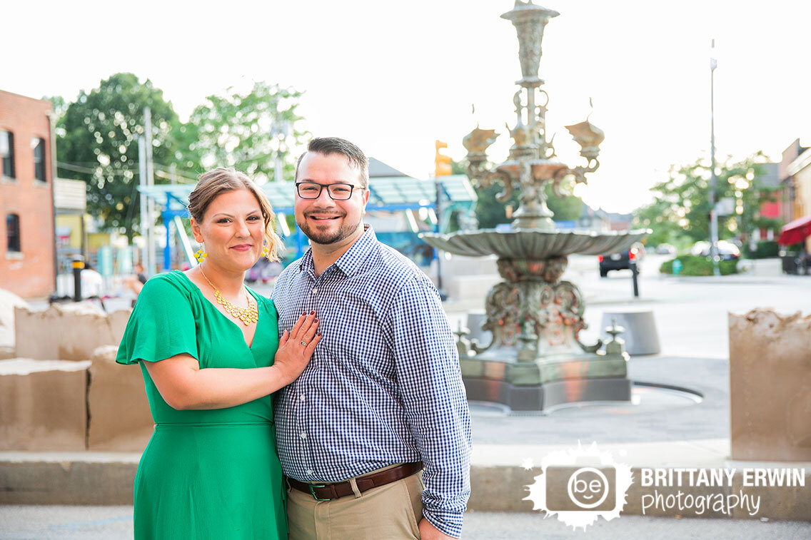 couple-in-fountain-square-summer-engagement-portrait.jpg